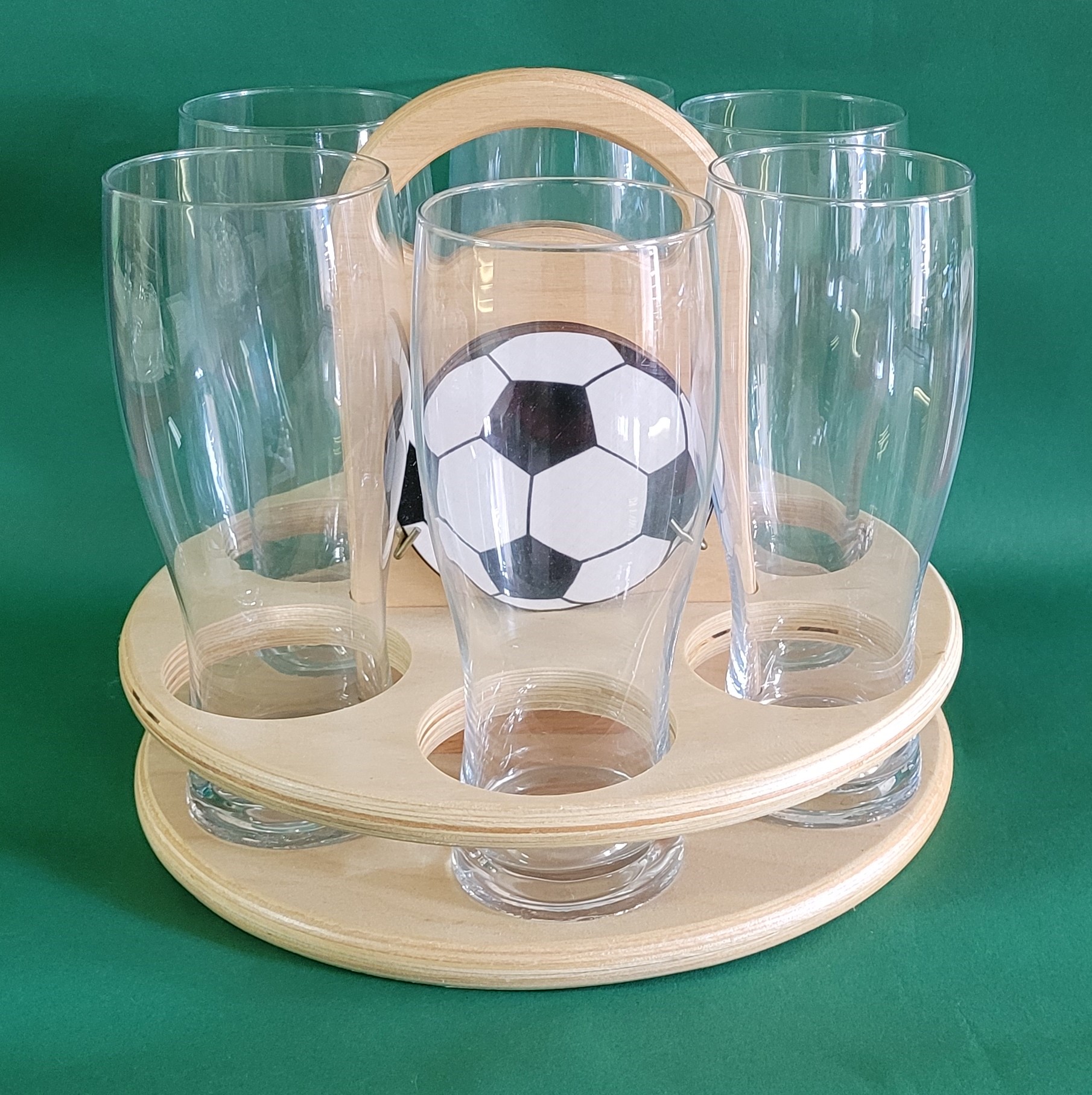 Träger mit Untersetzern in Ballform